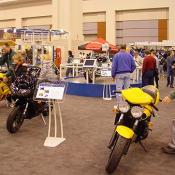 The yellow bike on the right is Triumph's Speed Four 4 cylinder naked sport bike.