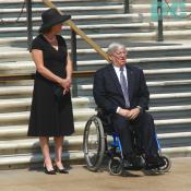 Disabled Veteran gets honored by watching the Memorial Day Ceremony from the front row.